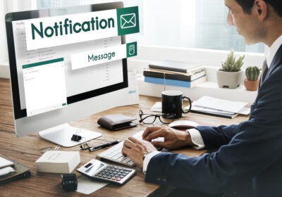 man receiving chat notification symbolizing email vs chat shift at work